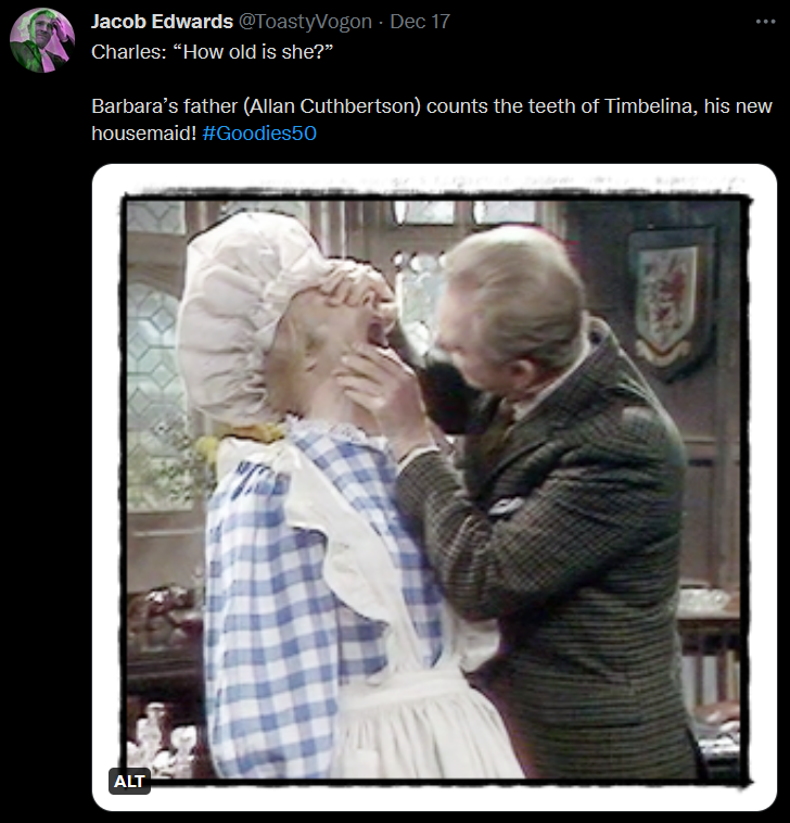 Tim, or rather, Timbelina wearing a maid’s outfit, has her teeth inspected by Barbara’s father (Allan Cuthbertson).