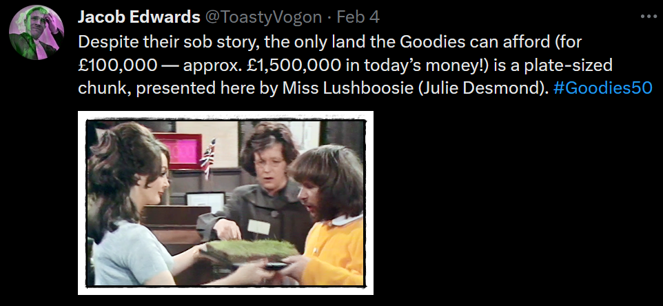 Tim (dressed as an old woman) and Bill (dressed as a baby in yellow romper suit) receive a cake-sized piece of land from Miss Lushboosie (Julie Desmond).